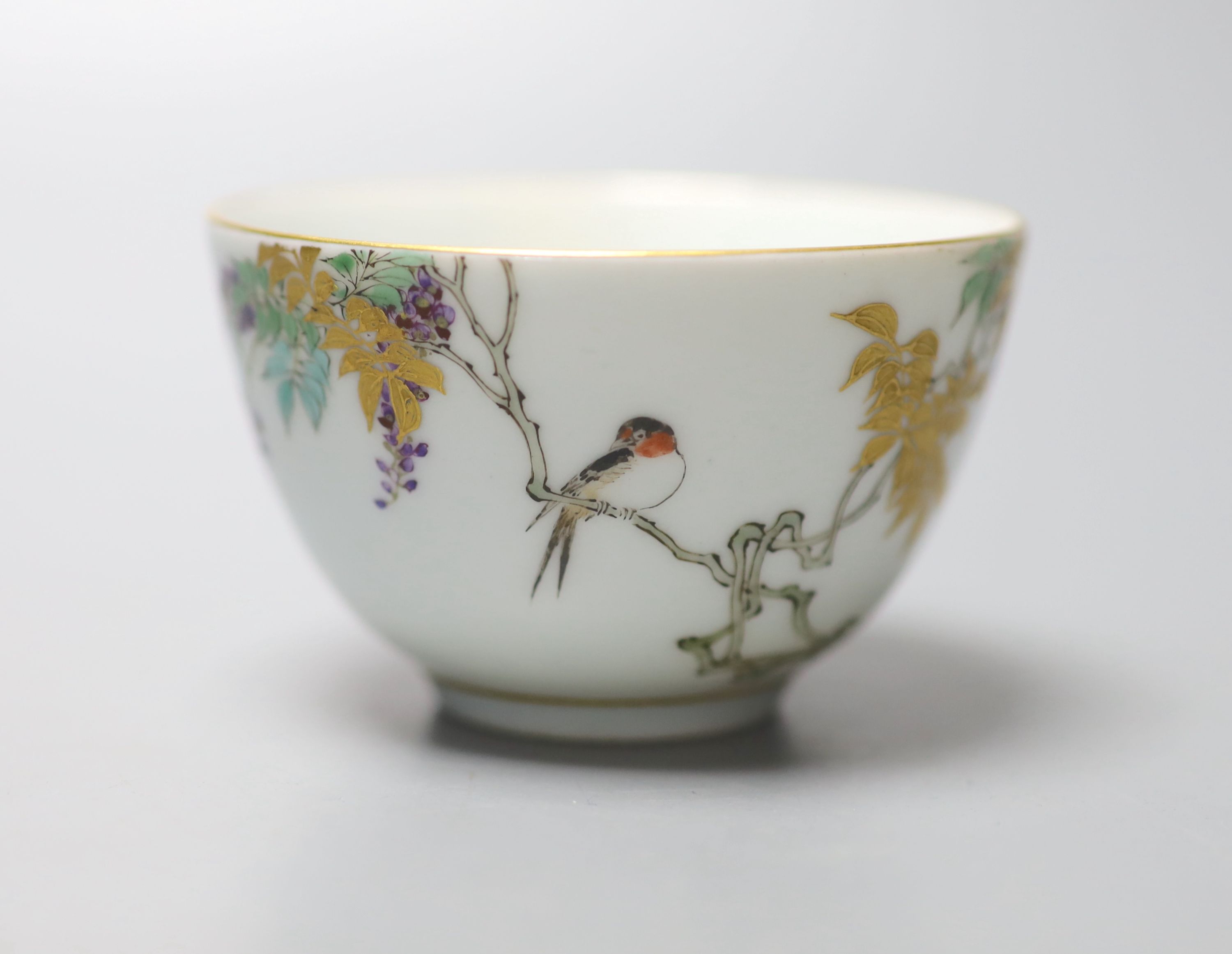 An unusual Japanese Kinkozan porcelain tea bowl, six character mark to base, Dia 8cm